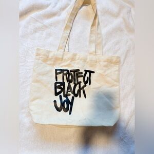 NWOT PROTECT BLACK JOY CANVAS TOTE